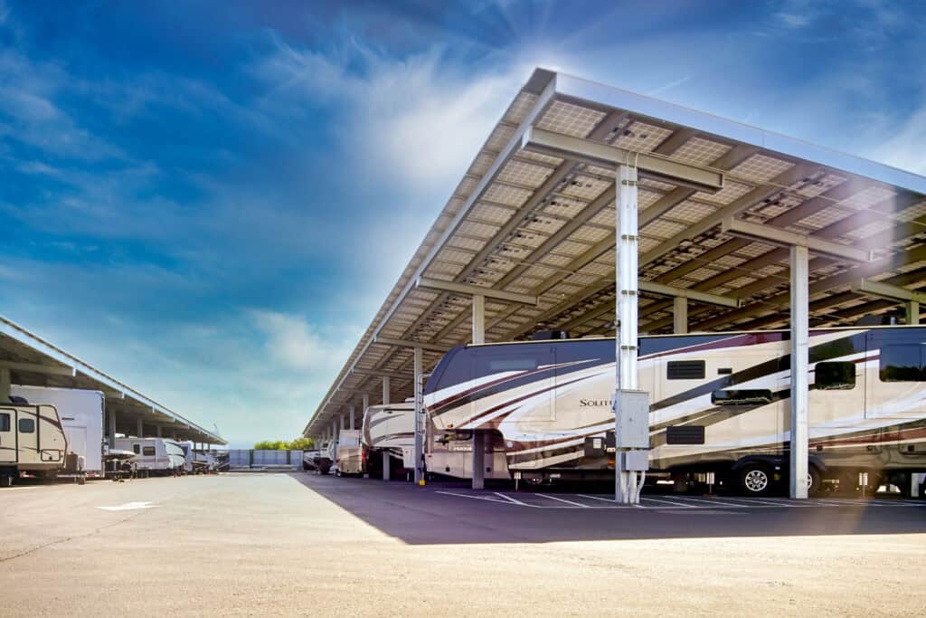 Outrig's Oakey Location Covered Parking with boats and RVs parked underneath on a sunny day