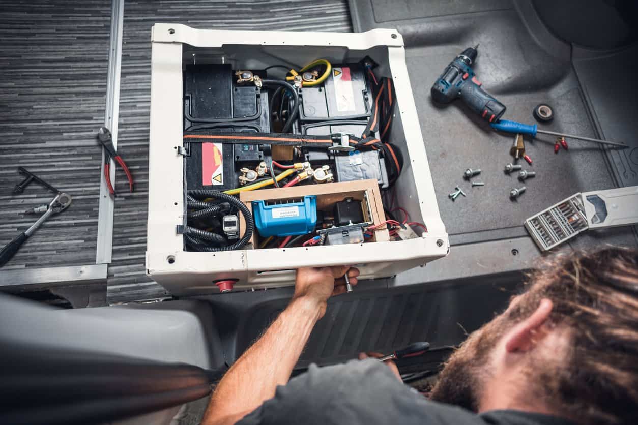 Man fixing an RV Battery