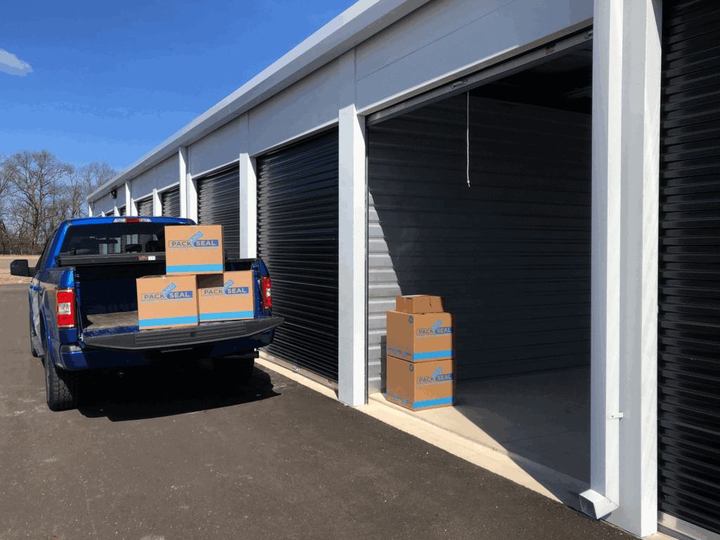LakeCounty_DriveUpSelfStorage Truck with boxes driving up to a self storage unit