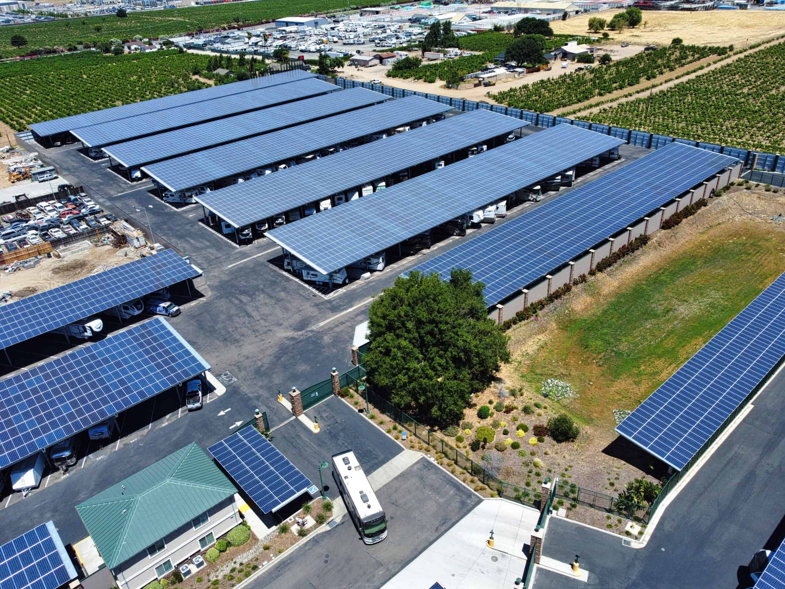 Aerial drone shot of Oakley's covered parking with solar panels on top