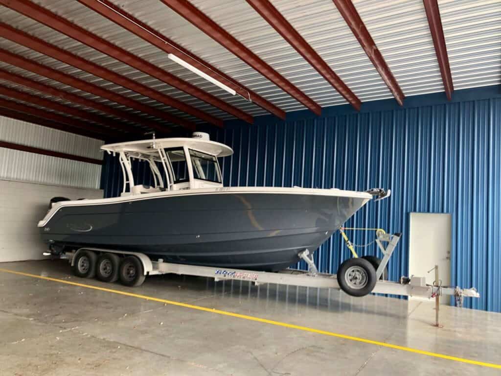A boat in covered parking at Outrig Orlando.